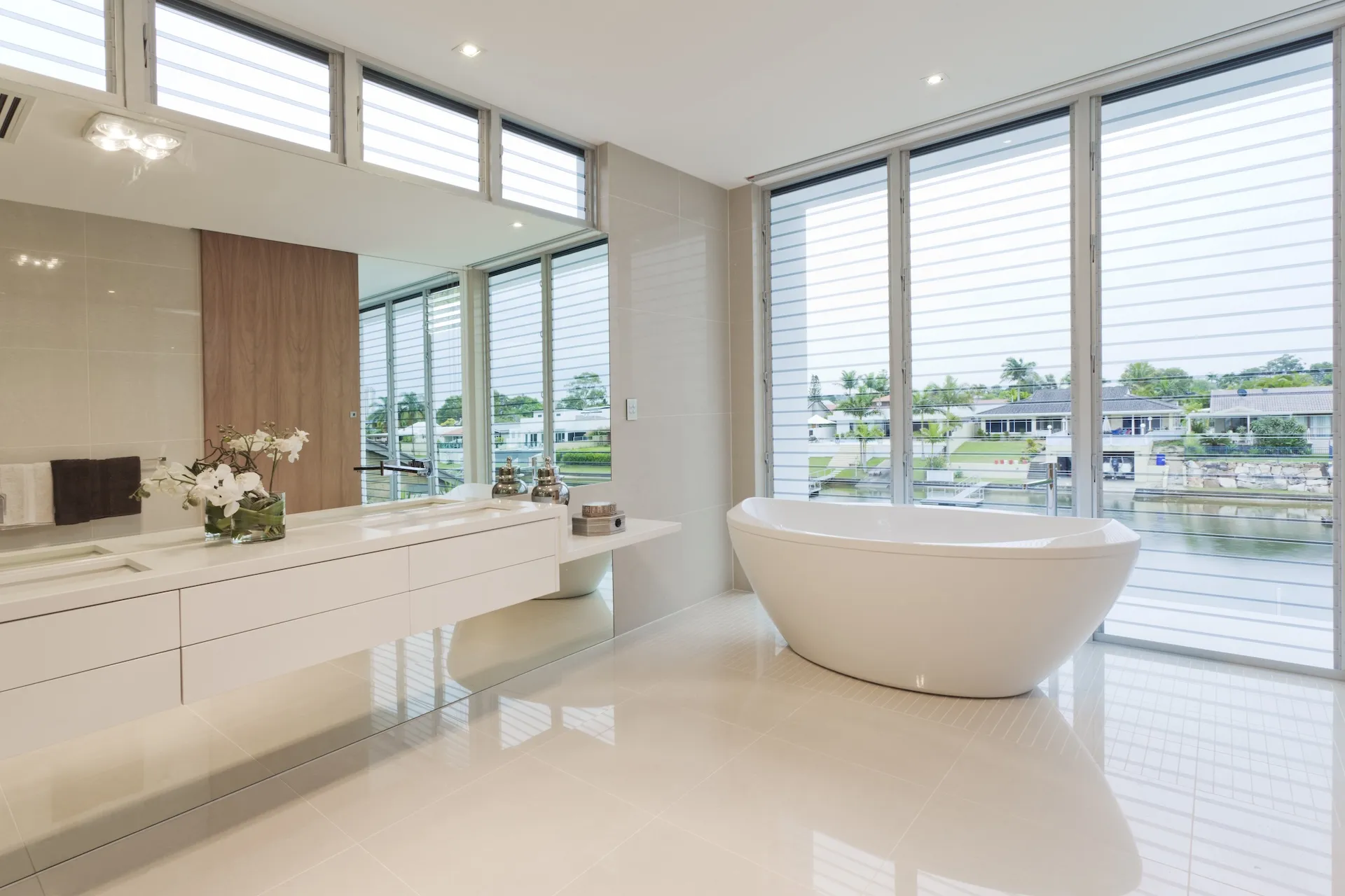 Polished dark hardwood floorboards in an empty Townsville home after a professional clean